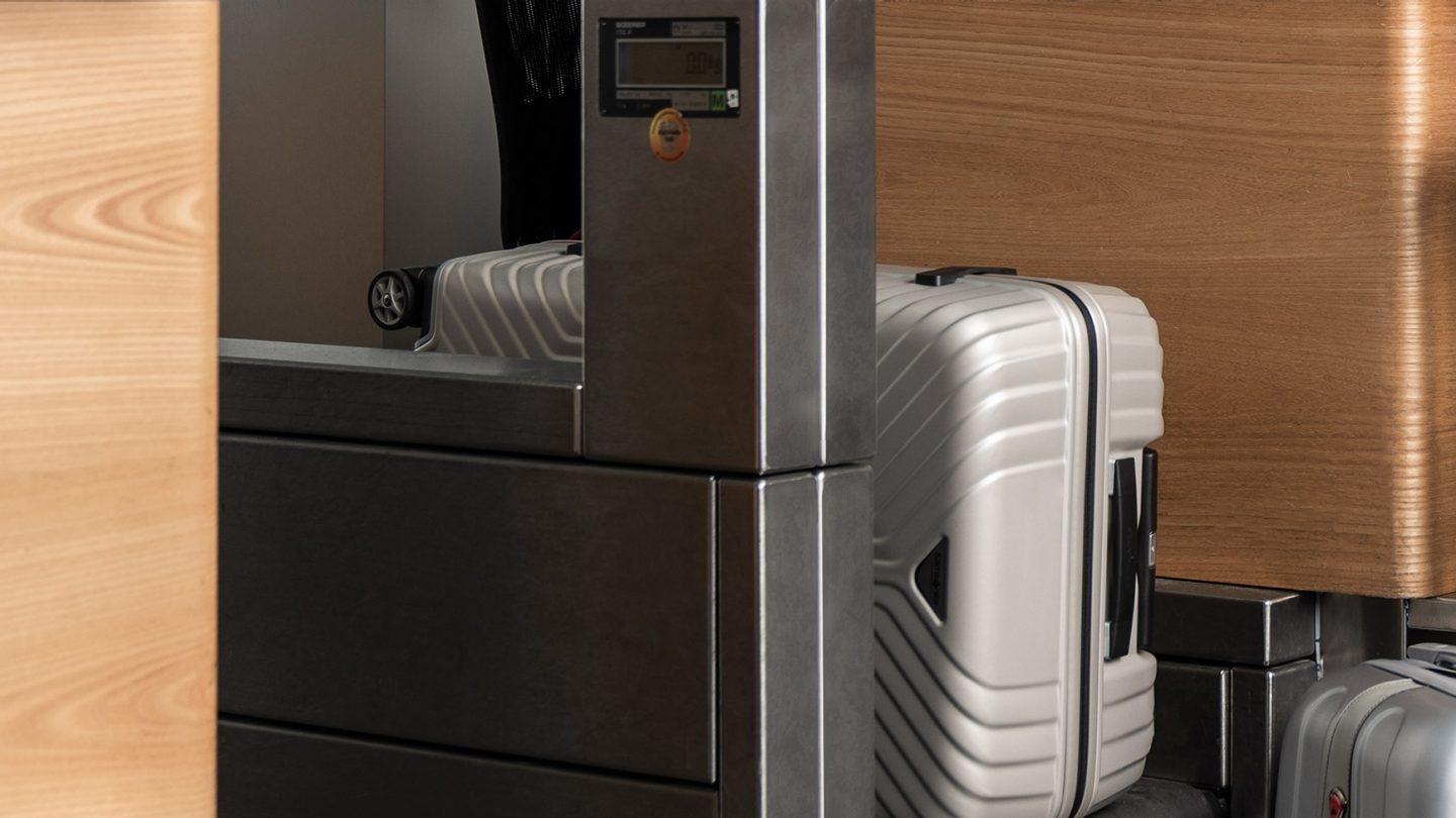 Baggage drop off at the check-in counter