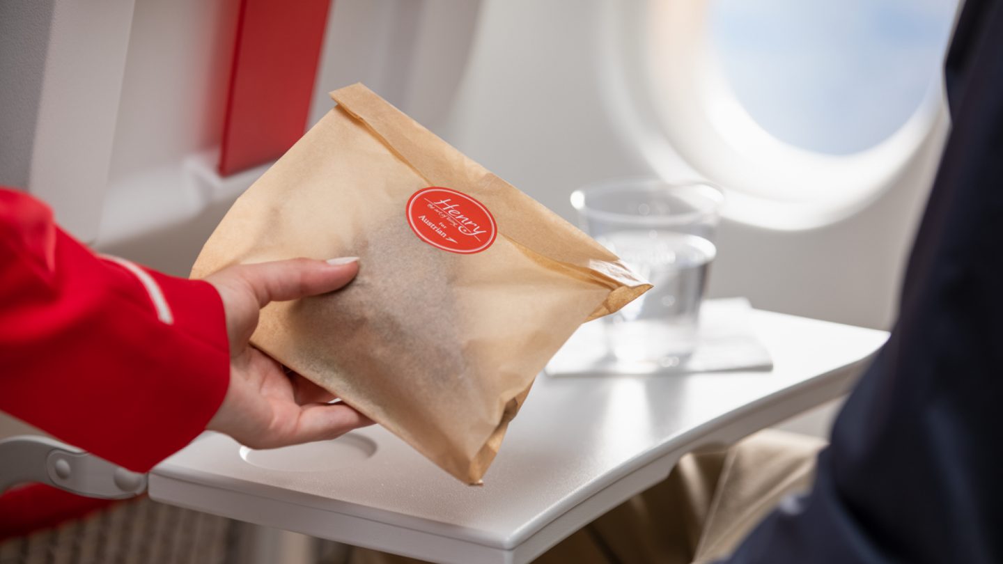 A snack bag is being passed over