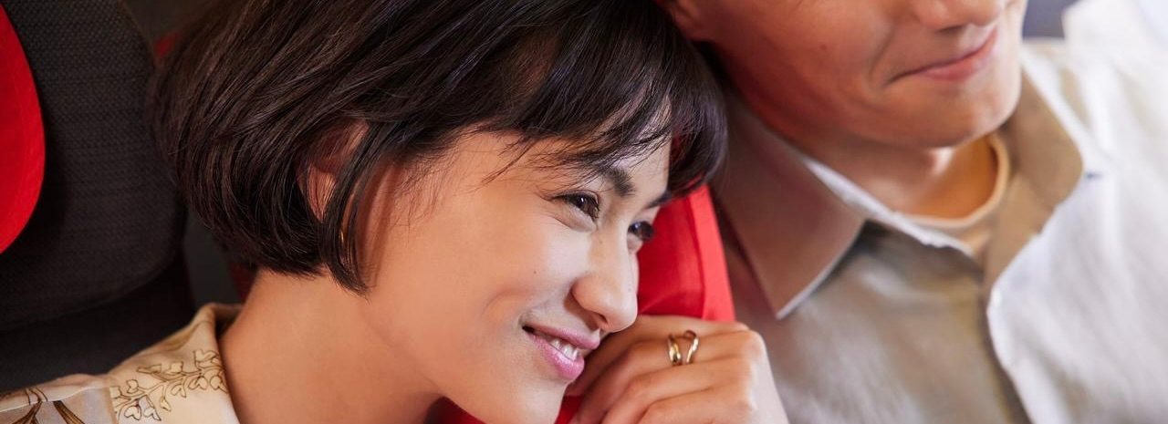Woman smiling.